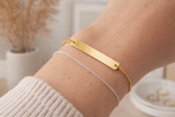 Gold tone bar bracelet with box chain, and sliding clasp ￼